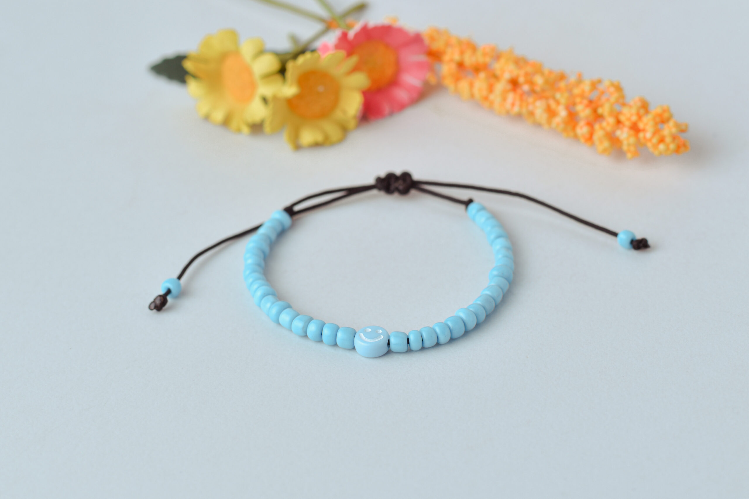 PULSERA SMILE - CELESTE PASTEL 🙂
